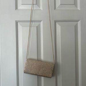 Ivory clutch with strap